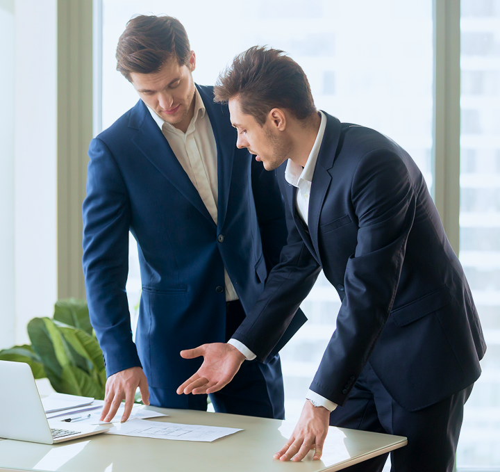 Business professionals reviewing documents
